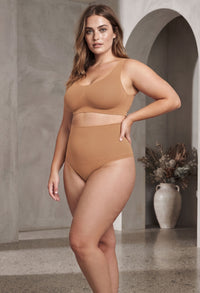 Invisible high waist shaping G-string under fitted clothing with a smooth no panty line finish